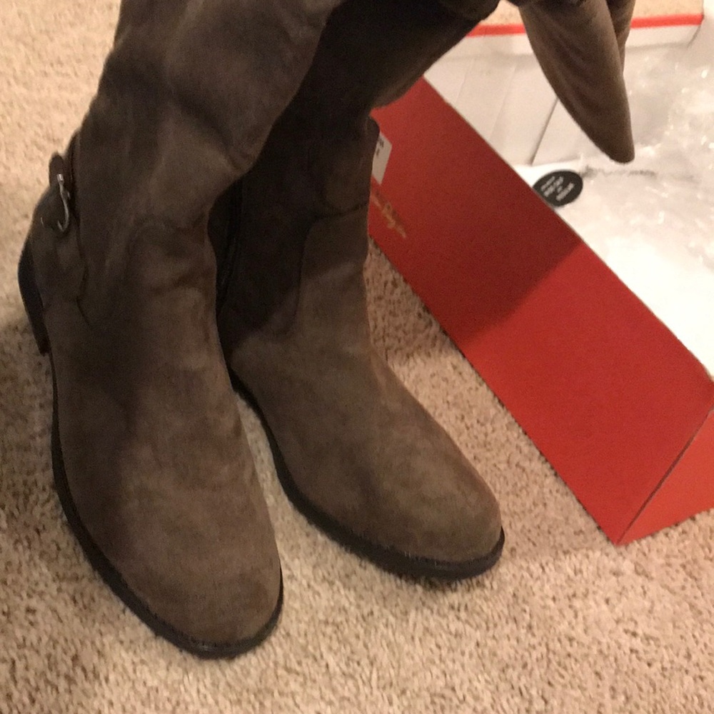 Over the knee. Super cute boots..